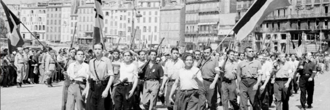 The FFI (Forces Françaises de l'Intérieur), which played a large role in the liberation of Marseille, parade on the Quai des Belges. August 1944. Source: ECPAD