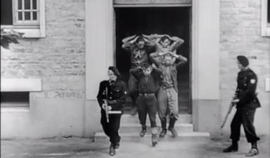 Résistants arrêtés par des miliciens après le débarquement de Normandie, juillet...