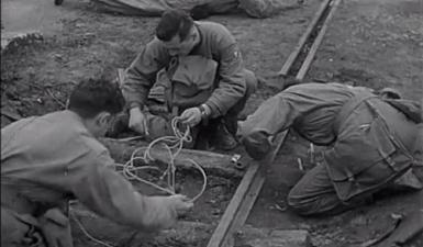 Sabotage d'une voie ferrée par le Bataillon de Choc, avril 1945 (commentaire d'é...