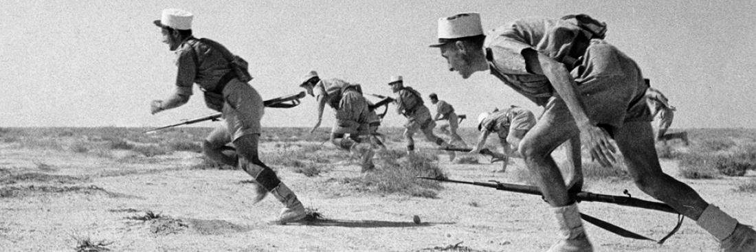 French Legionnaires attack an enemy position at Bir Hakeim, 12 June 1942. Source: Imperial War Museum.